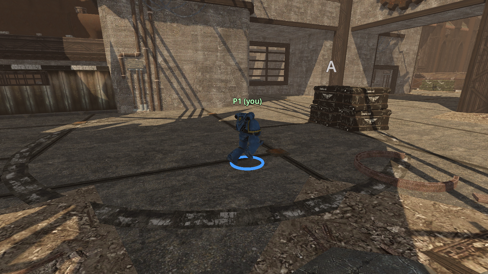 A blue-armoured Assault Marine moving through the industrial Manufactorum arena